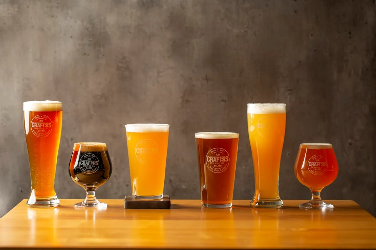Precision Porter in a glass with warm moody lighting and tavern-style background